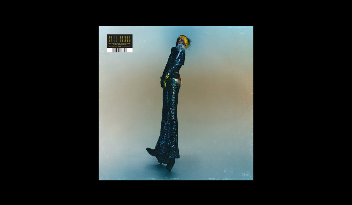 Cover of the vinyl record Yves Tumor - Praise A Lord Who Chews But Which Does Not Consume (Or Simply Hot Between Worlds), available at Rekorder.cz