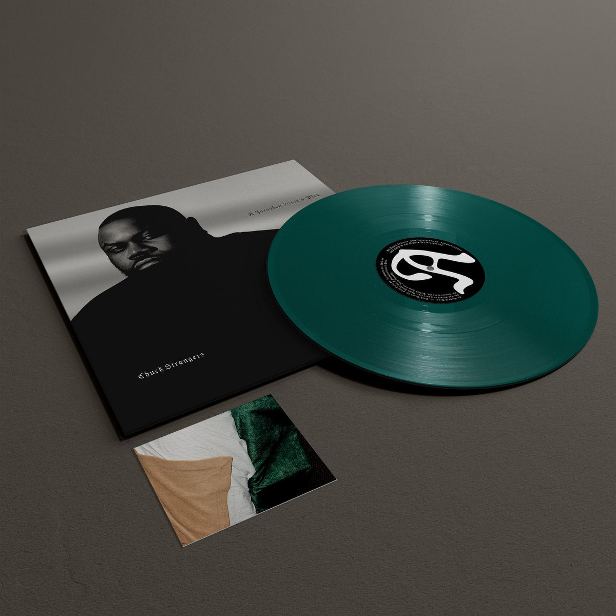 Cover of the vinyl record Chuck Strangers - A Forsaken Lover's Pleas (+ FLEXI DISC), available at Rekorder.cz